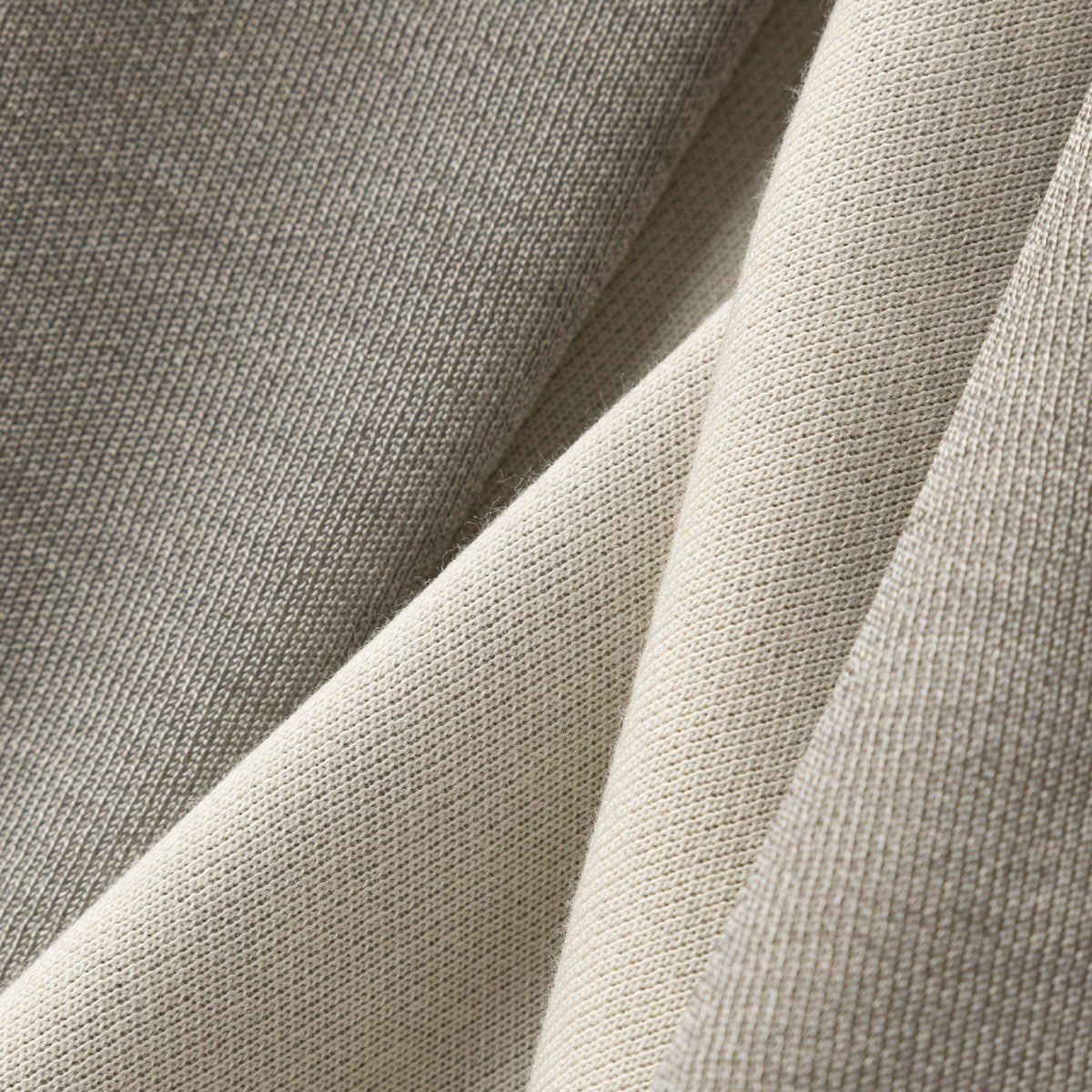 Silver Knit Fabric in Bone White Color, which has excellet EMF shielding performance while maintian the  softness and asethical looking just like regular fabric