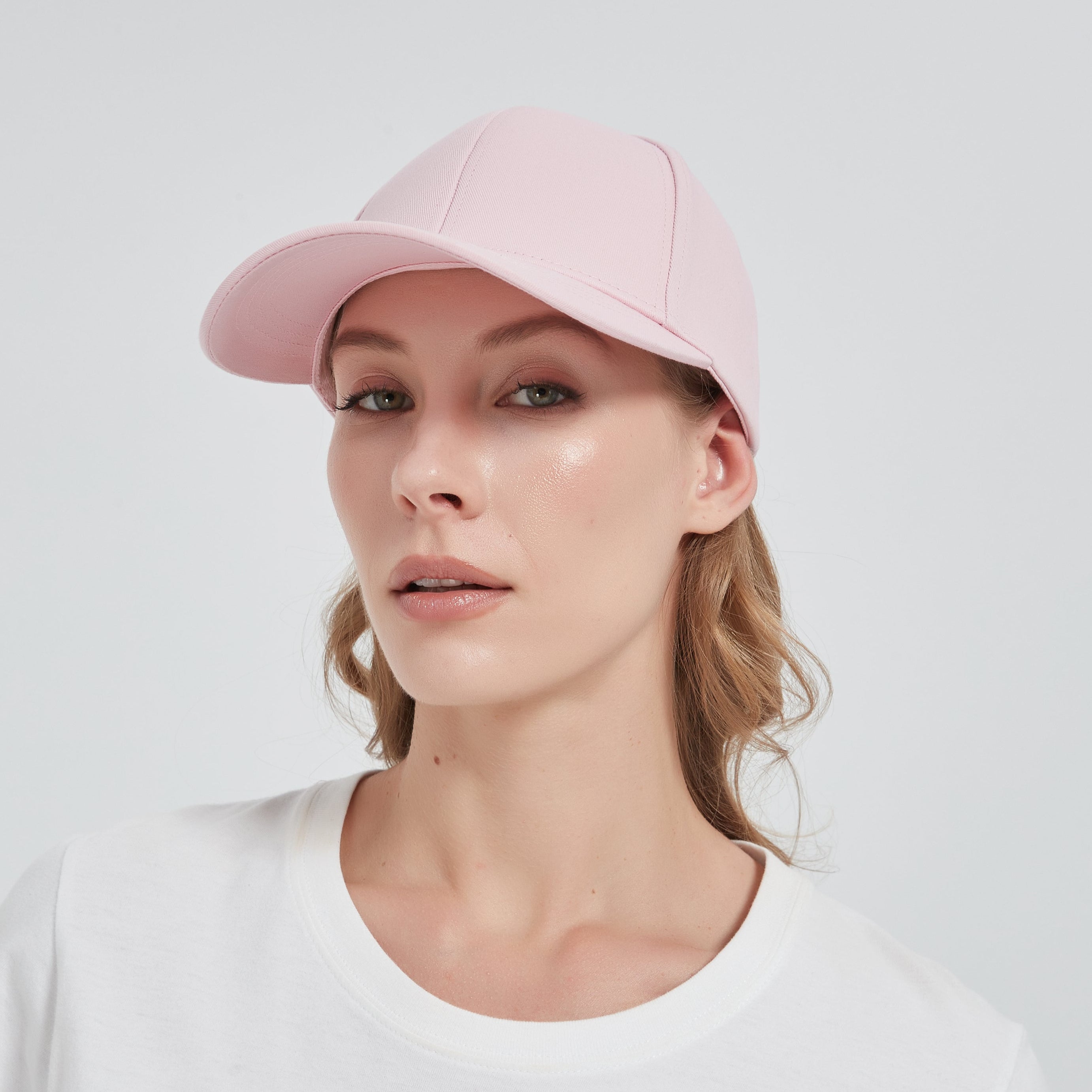 Female model is wearing a EMF Cap made by silver cotton fabric to block electromagnetic radiation
