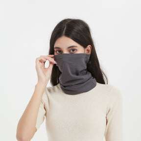 Front view of a female model use EMF Thyroid Protector in Heather Navy Color to cover face