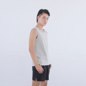 Side view of Male model wearing a EMF tank top in heather grey color