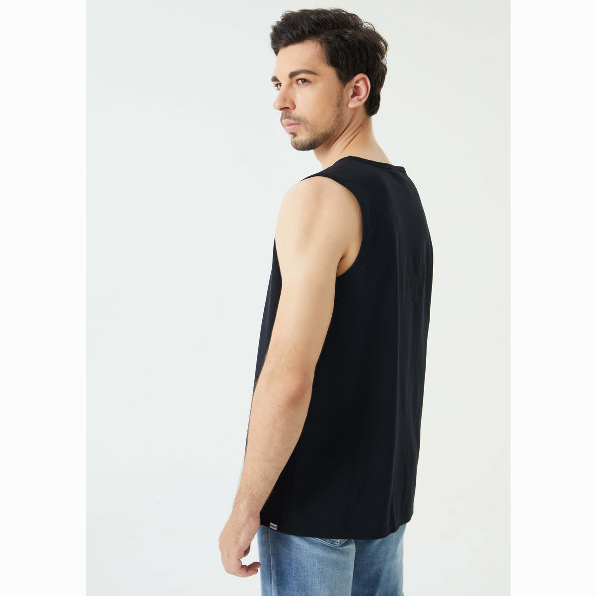 Side view of EMF Tank Top made from silver jersey fabric