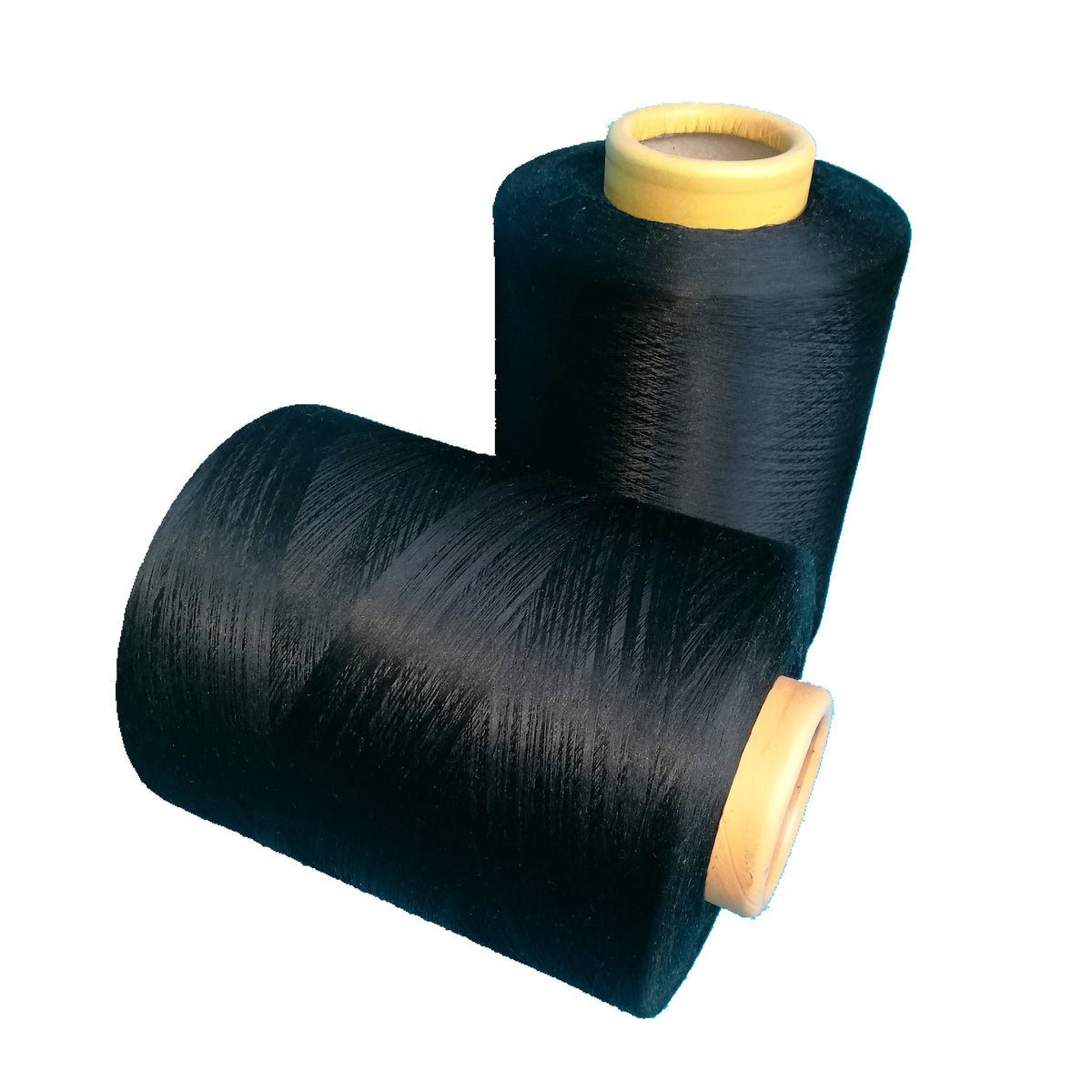 Two Cone of Black Copper Polyester Yarns