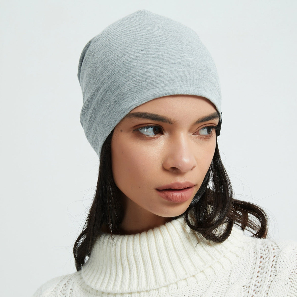 Women with EMF Beanie Grey color, close view