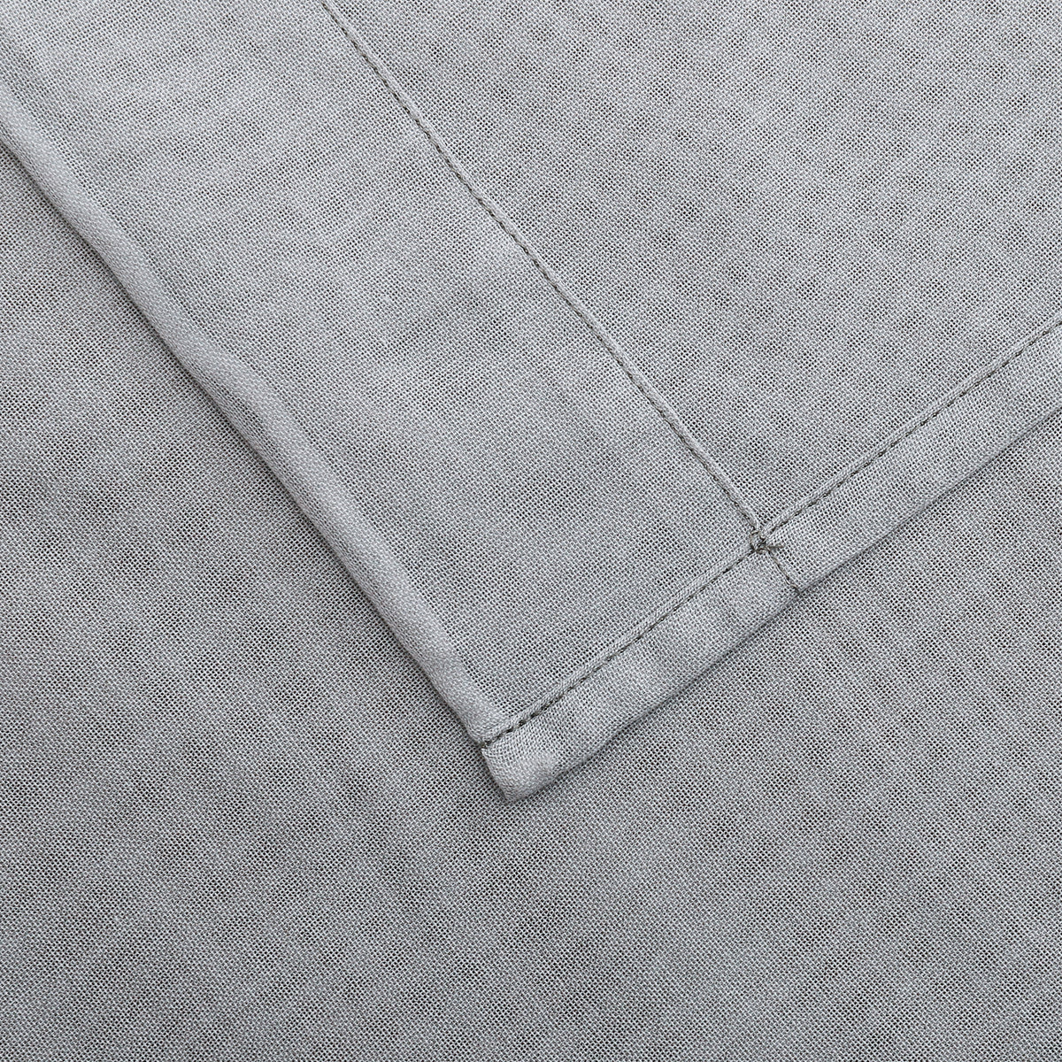 Curtain corner and stitched hem, close-up